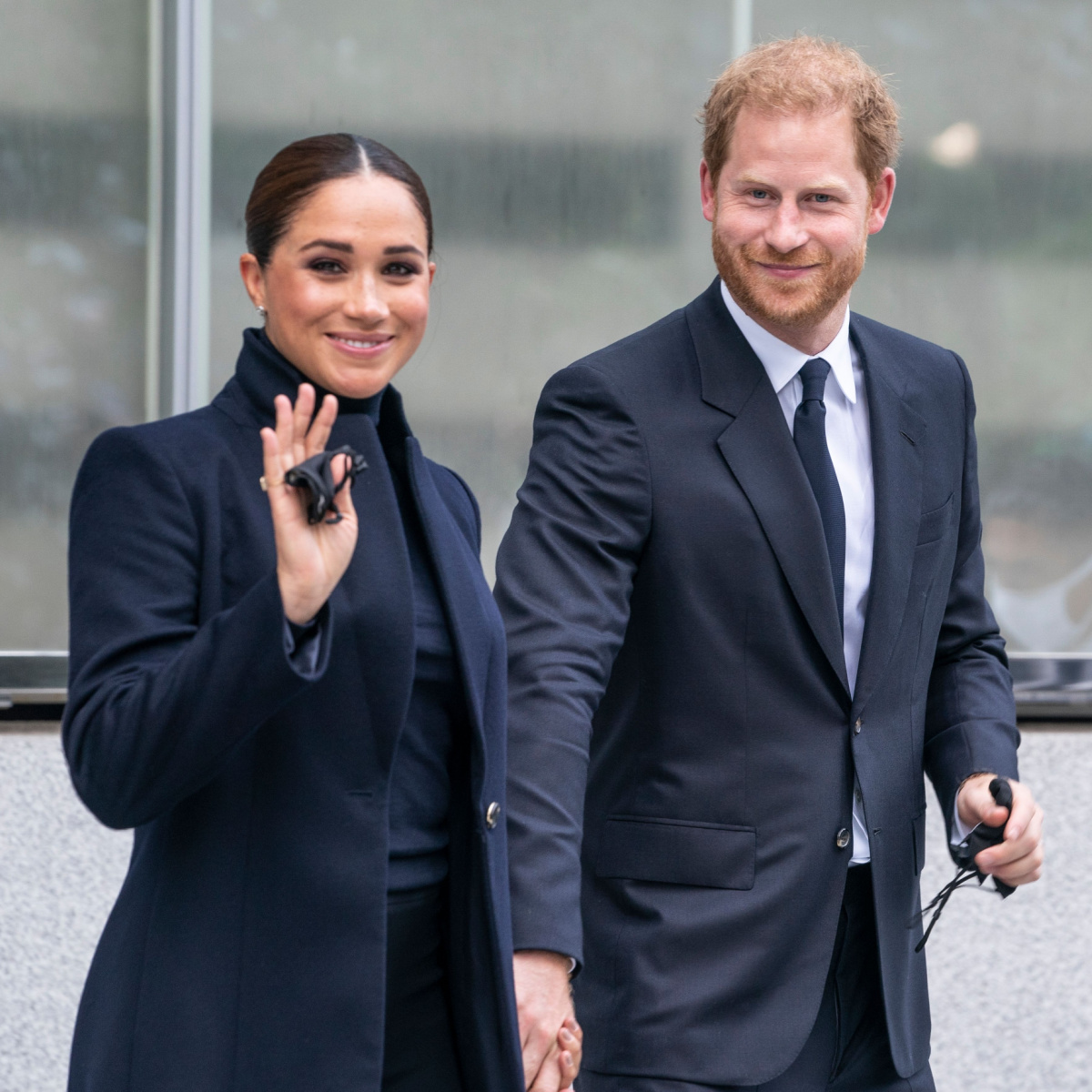 meghan markle prince harry black dress black coat suit holding hands new york city