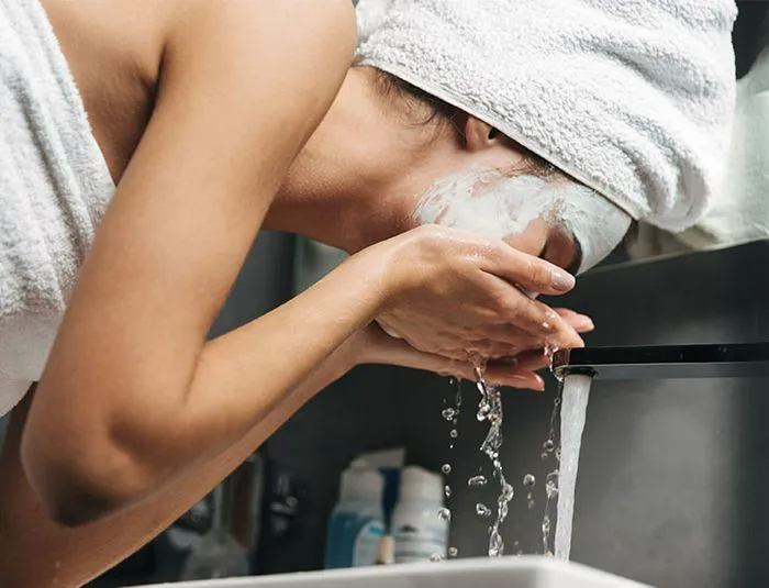 woman-washing-face
