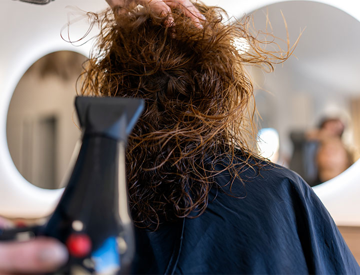 woman-hair-blow-dried