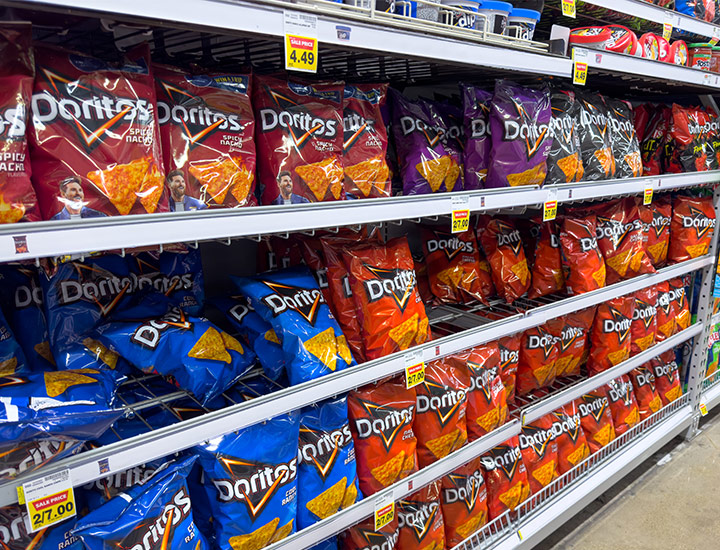 Doritos chips bags on shelves