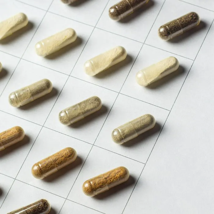 Variety of herbal supplement capsules for dietary support.