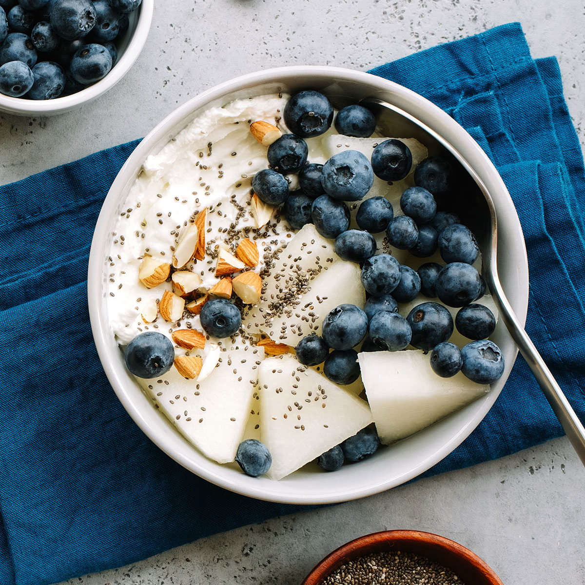 yogurt bowl with blueberries almonds and chia seeds