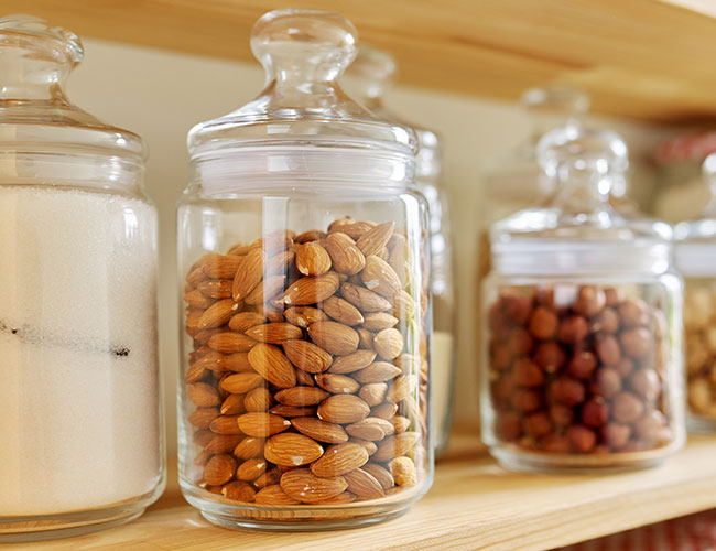 jars of almonds and other nuts in pantry