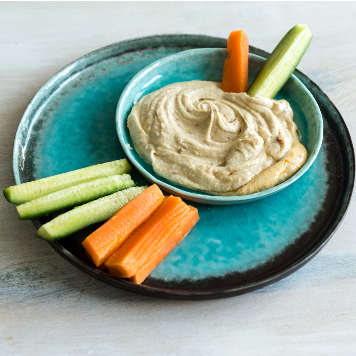 cucumber and carrot sticks with hummus