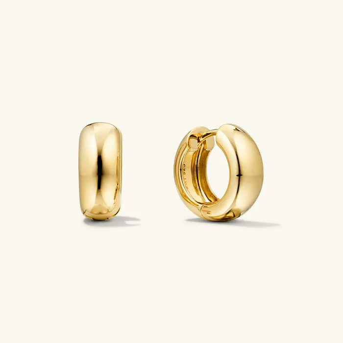 Medium chubby hoop earrings in angled view