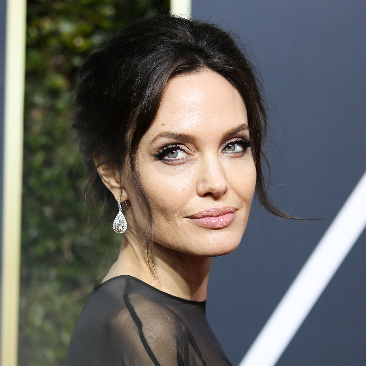 Angelina Jolie's Bags Reflect Her Timeless & Elegant Style