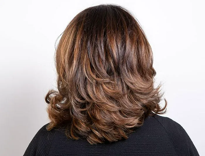 back-woman-head-layered-hair