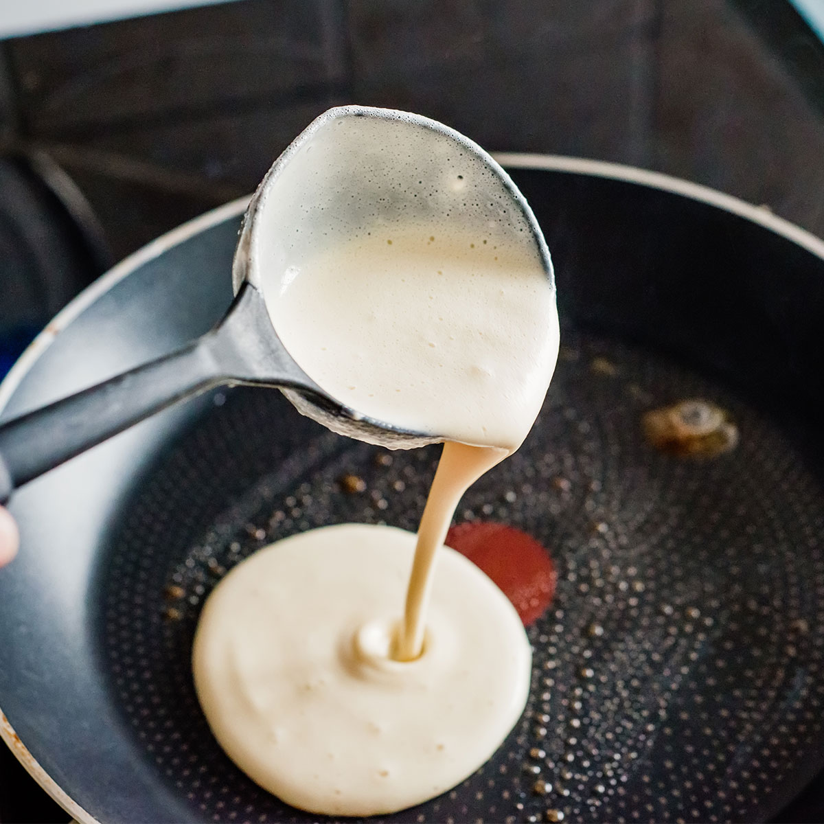 pancake pouring into pan
