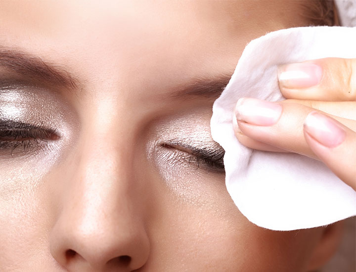 woman-removing-eye-makeup