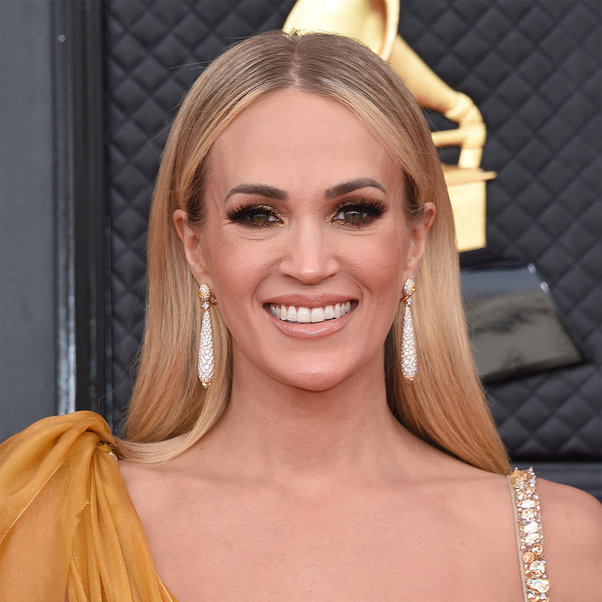 Carrie Underwood Serves Denim, Metallic, And Fringe Looks For Her