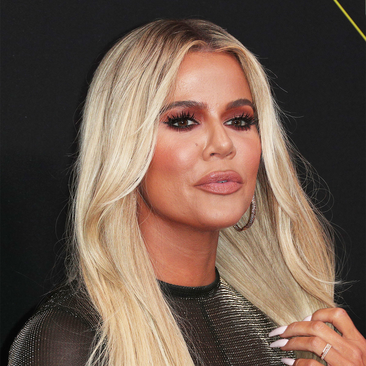 Khloé Kardashian Fans Express Their 'Sadness' After Seeing Throwback Photos  Of The Star 'Before Plastic Surgery' - SHEfinds