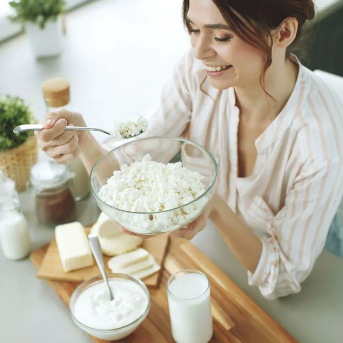 woman eating cottage cheese