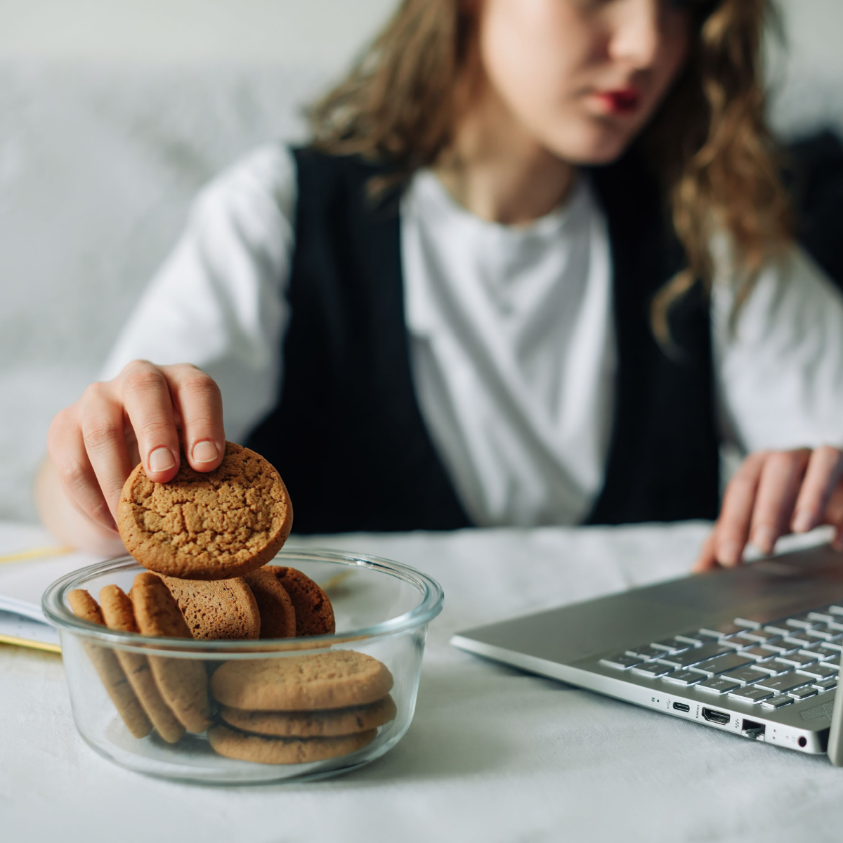 woman eating cookies