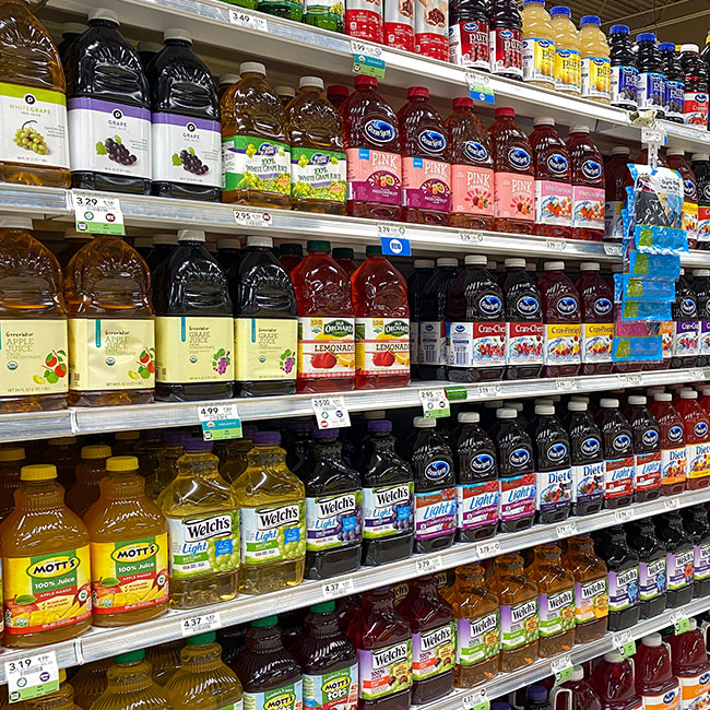 fruit juice aisle at grocery store