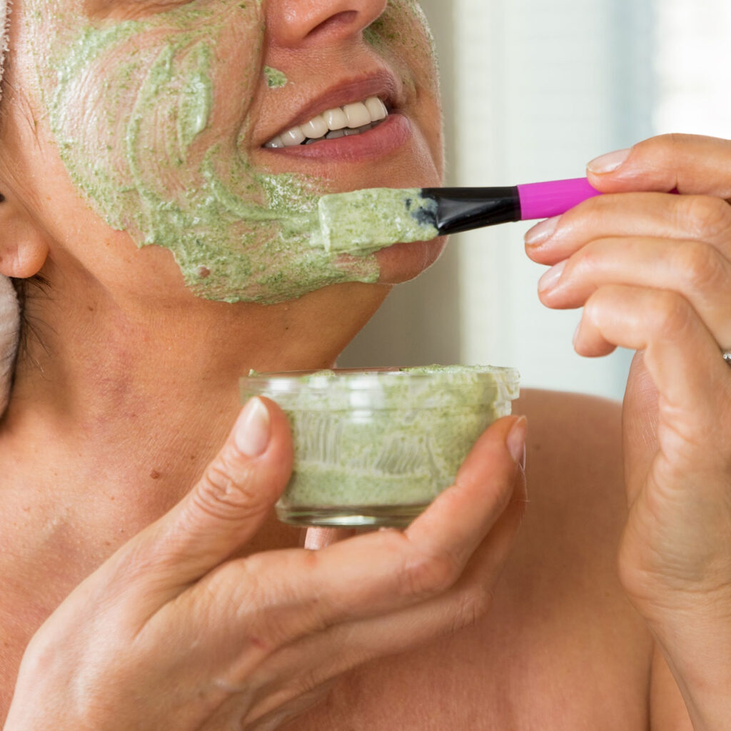 https://www.shefinds.com/files/2023/12/older-woman-applying-green-face-mask-1024x1024.jpg