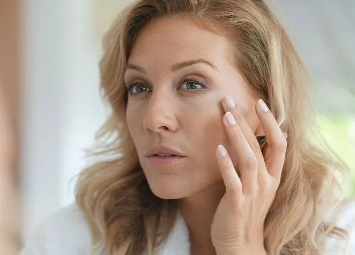 woman-looking-at-skin
