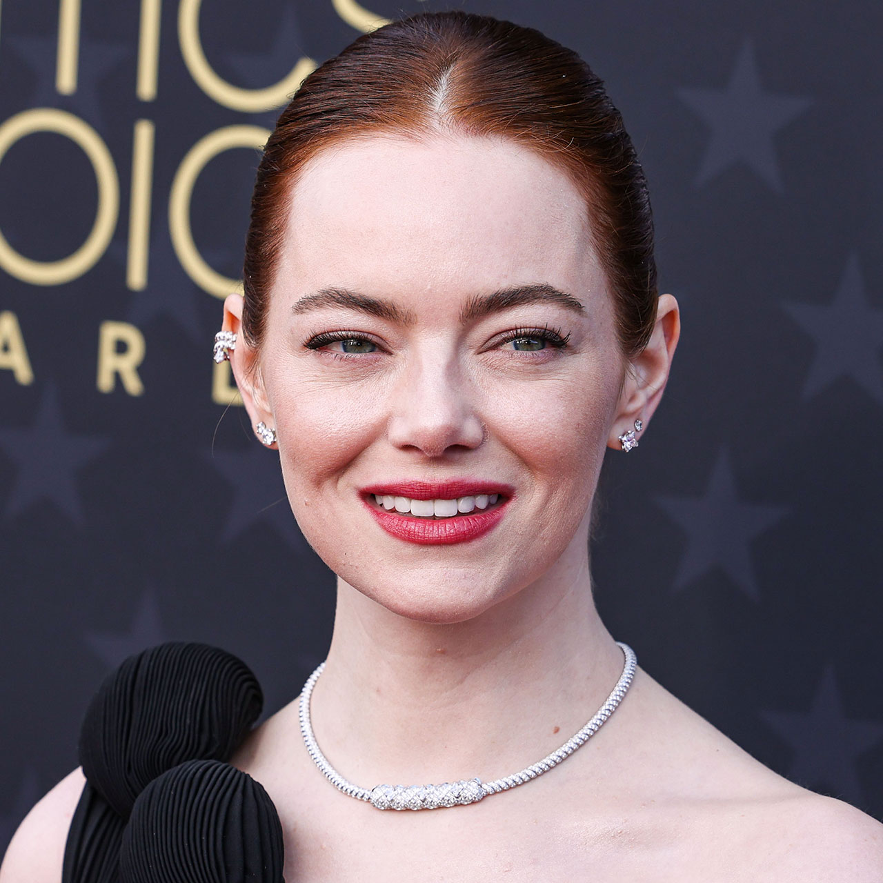 Emma Stone Stuns In An Elegant Black Louis Vuitton Gown As She Takes Home  The Critics Choice Award For Best Actress - SHEfinds