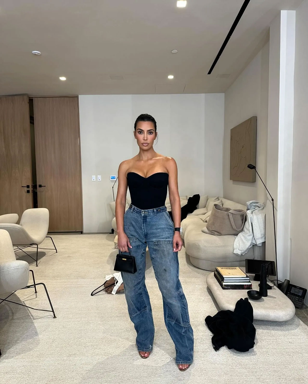 Kim Kardashian bandeau top wide leg jeans Instagram Story