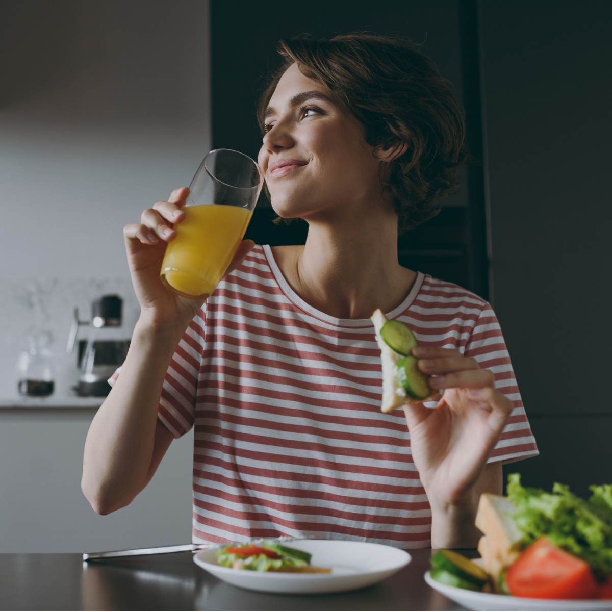 girl drinking orange juice