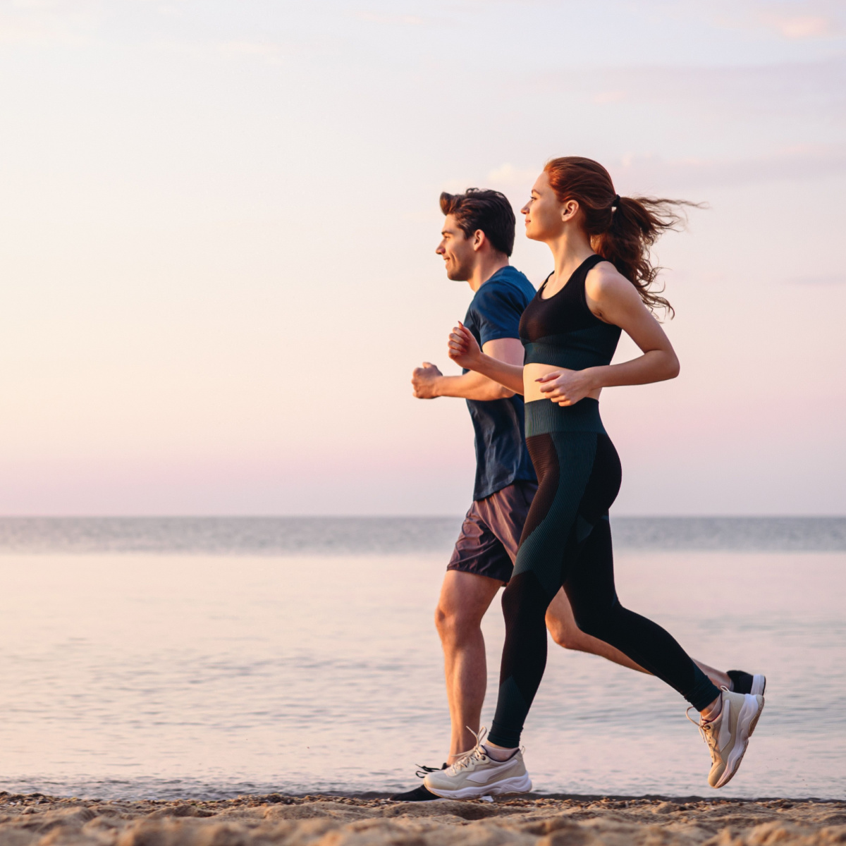 man and woman jogging