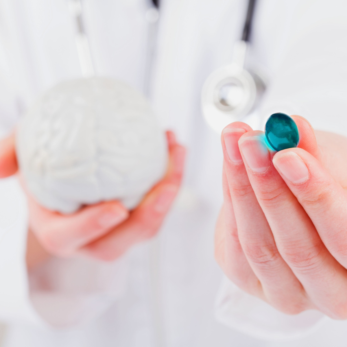 doctor holding pill