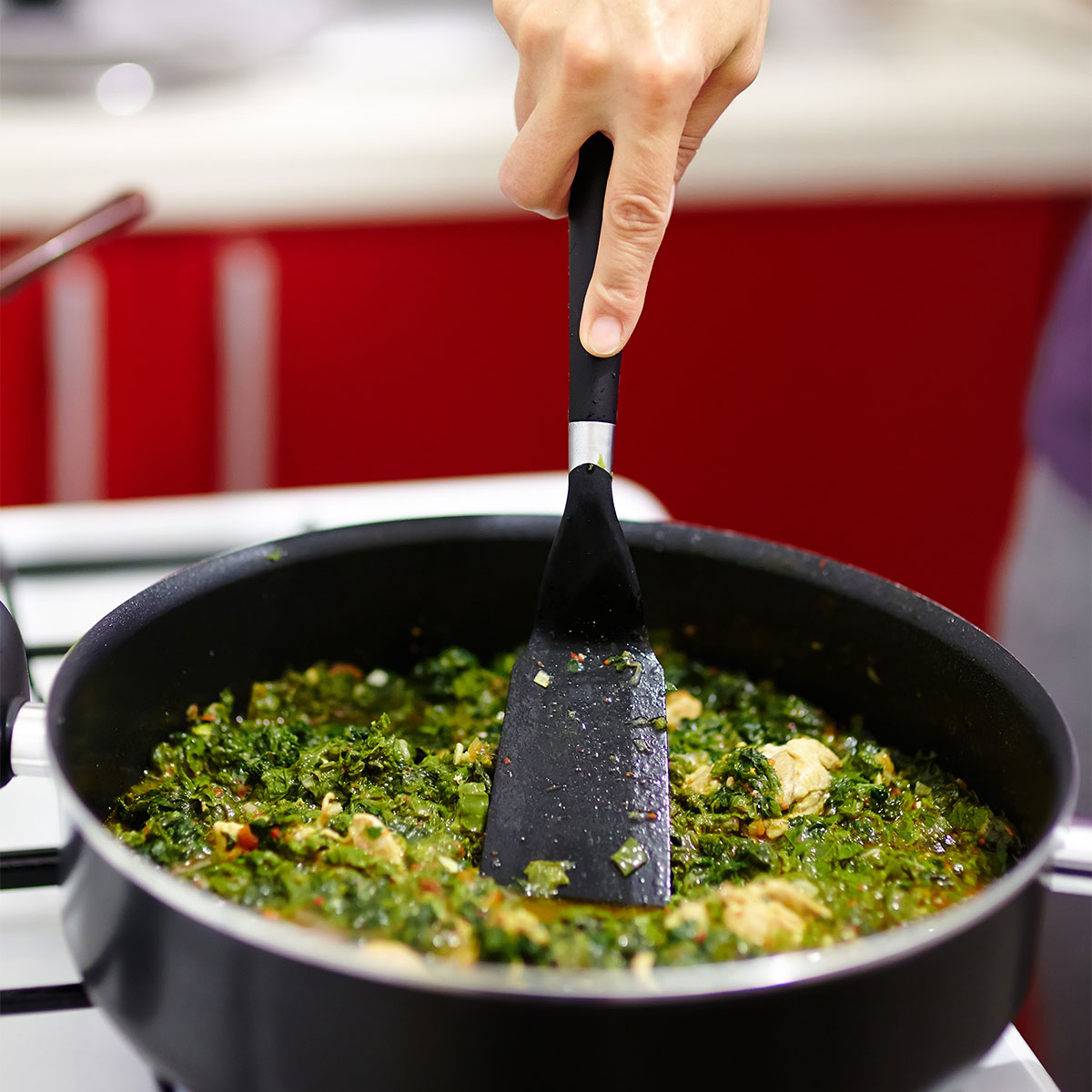 spinach and leafy greens in pan