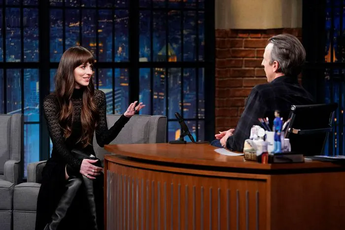 dakota johnson with seth meyers on the late night show february 7