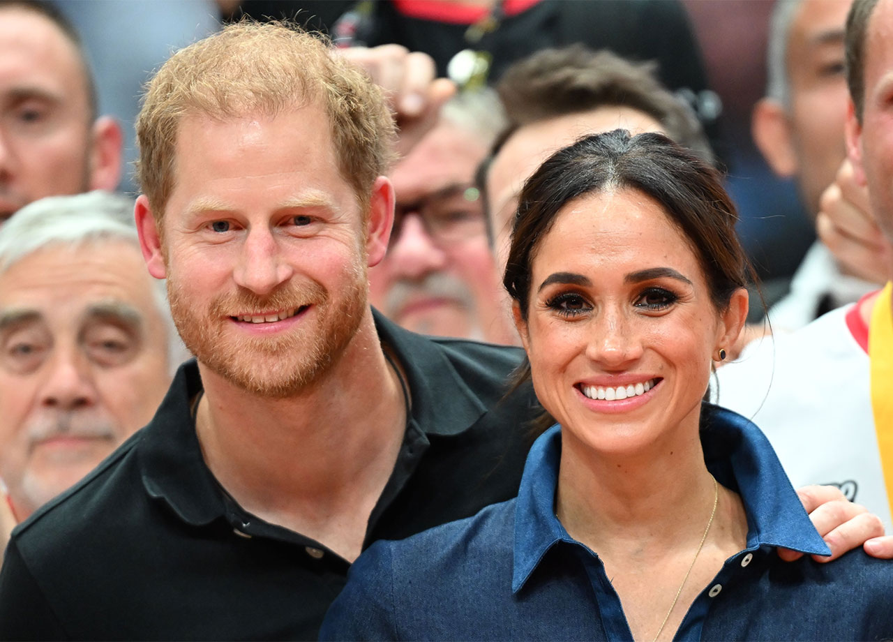 Prince Harry Meghan Markle smiling Invictus Games