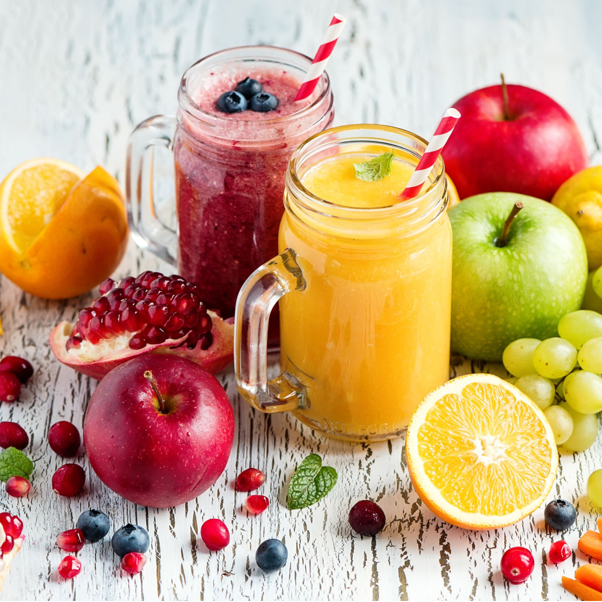 fruit juices in glass cups