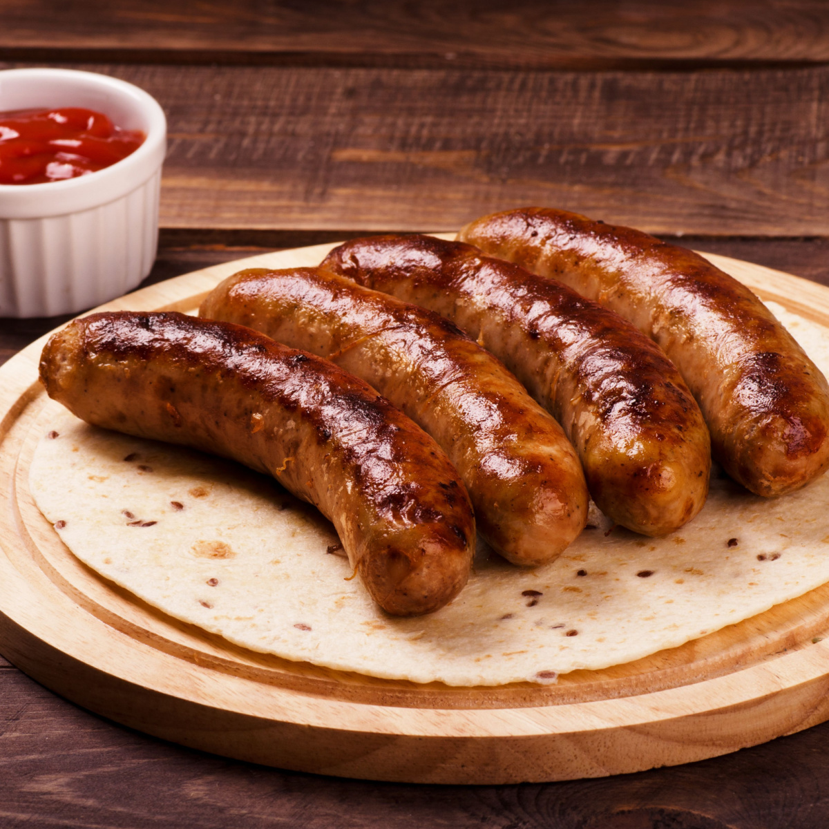 sausages on a wooden board
