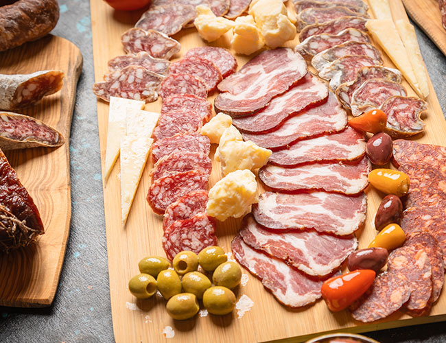 charcuterie board with processed meats