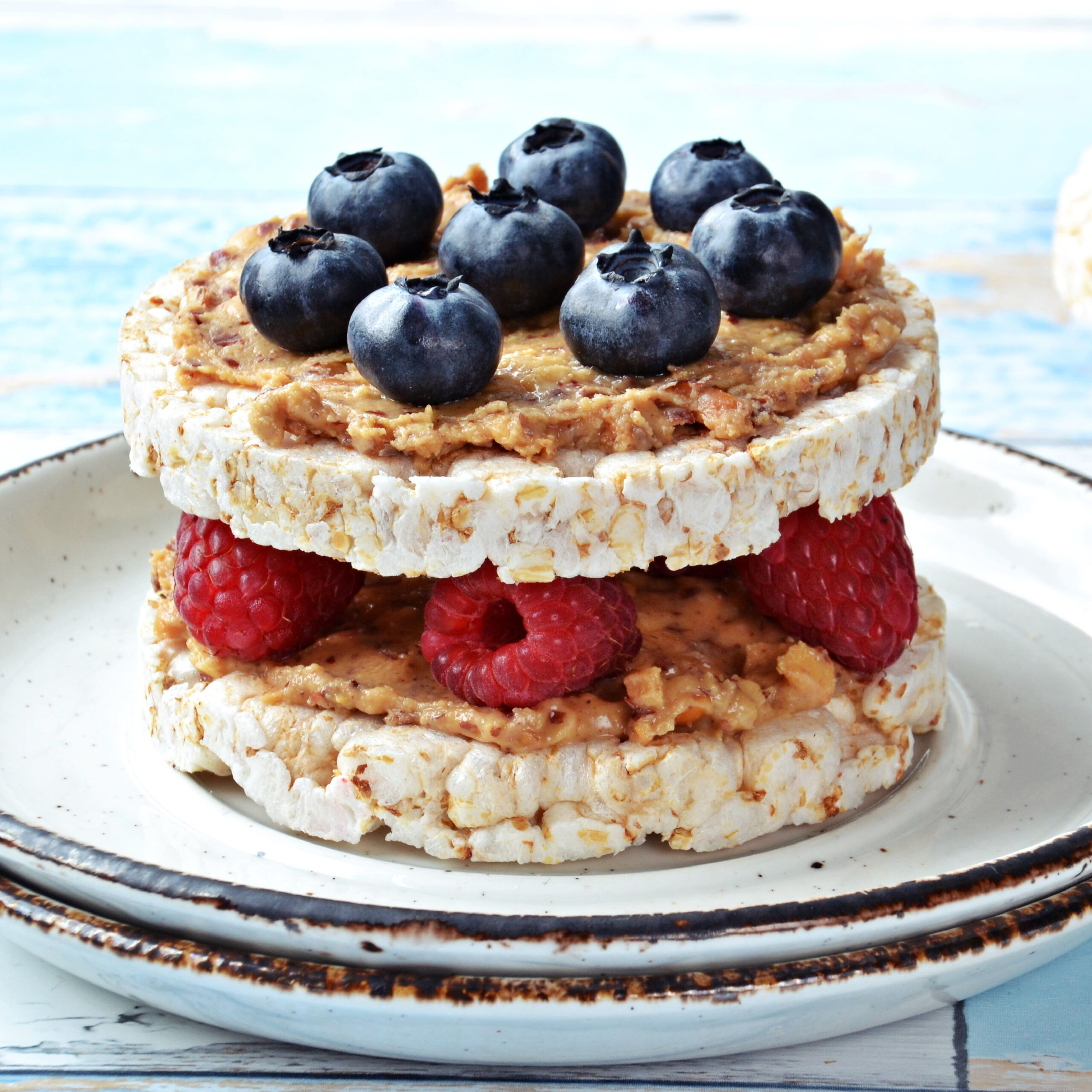 rice cakes with nut butter and berries