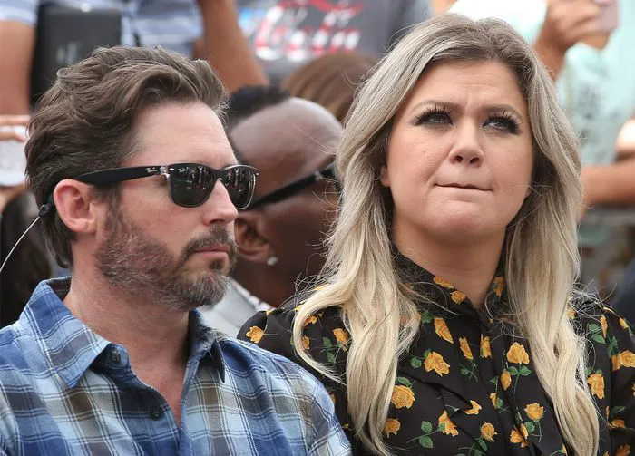 Kelly Clarkson and Brandon Blackstock together at a public event.
