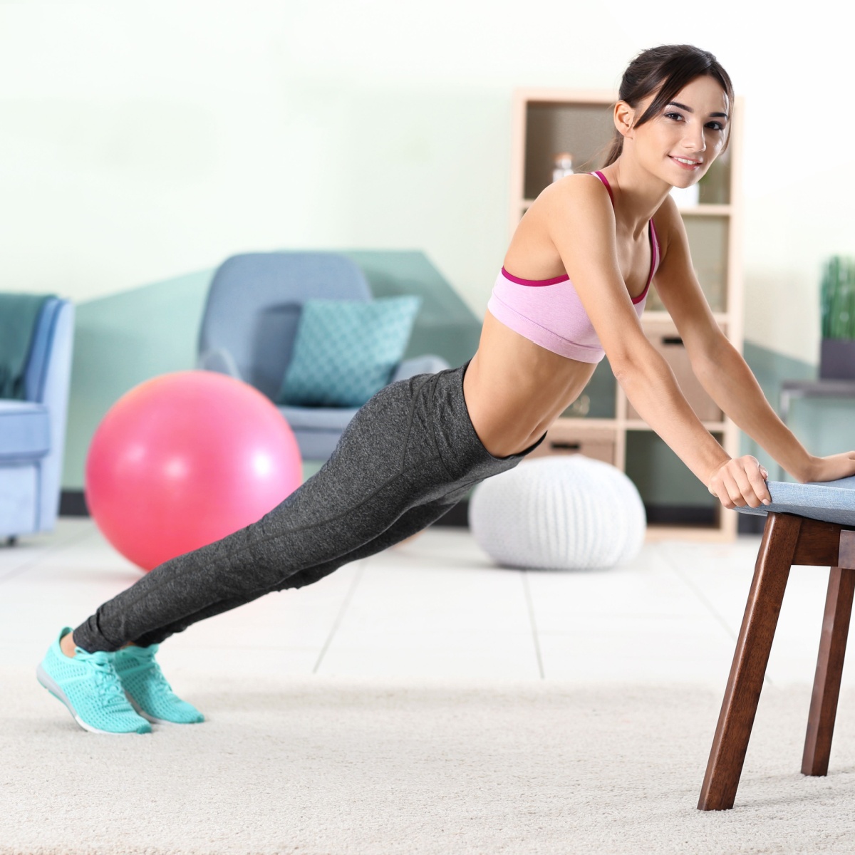 woman doing chair planks