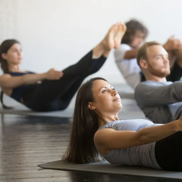 people doing leg raises