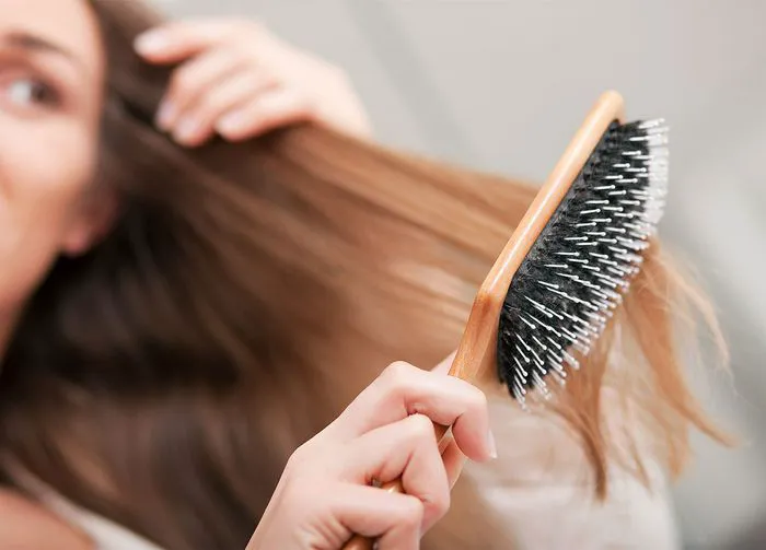woman-brushing-hair
