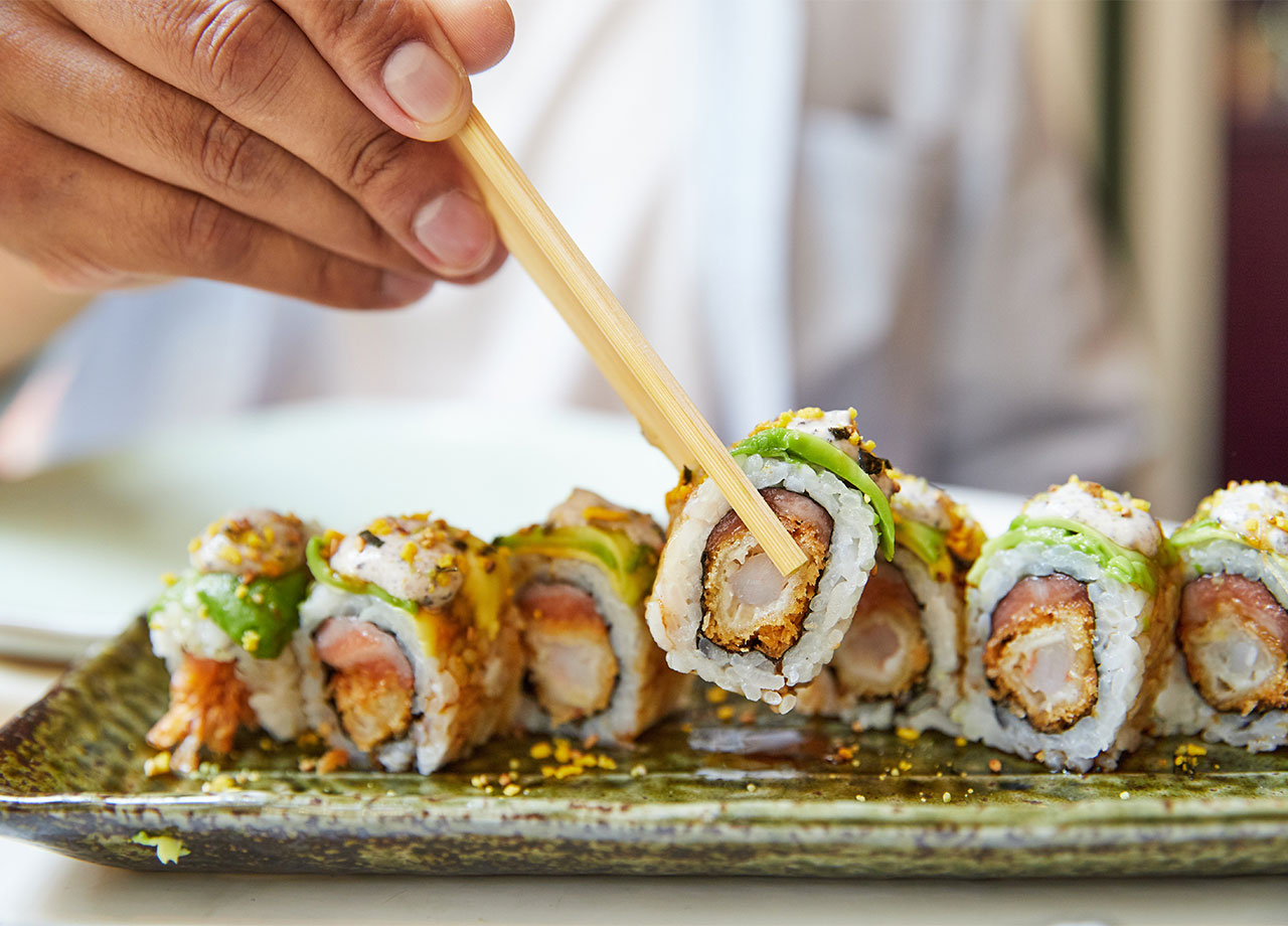 people eating sushi