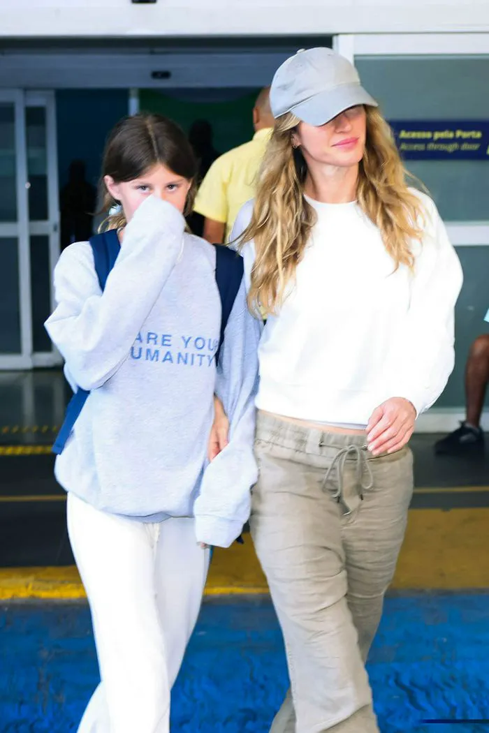 Gisele Bundchen and daughter at Galeao Airport, Rio de Janeiro.