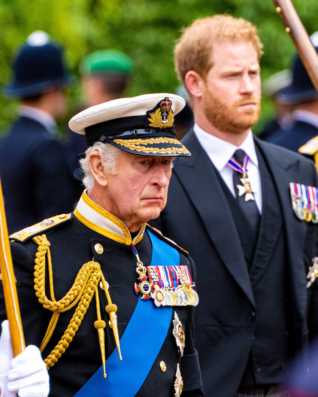 King Charles with Prince Harry in regalia