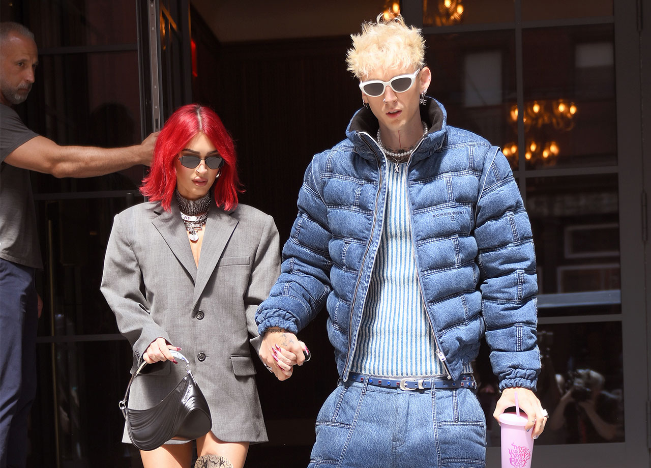 Megan Fox Machine Gun Kelly holding hands leaving New York hotel