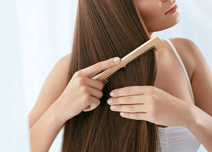 Woman with long straight brown hair