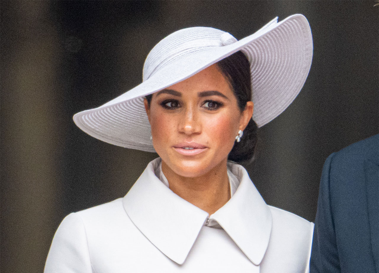 Meghan Markle wearing a white hat