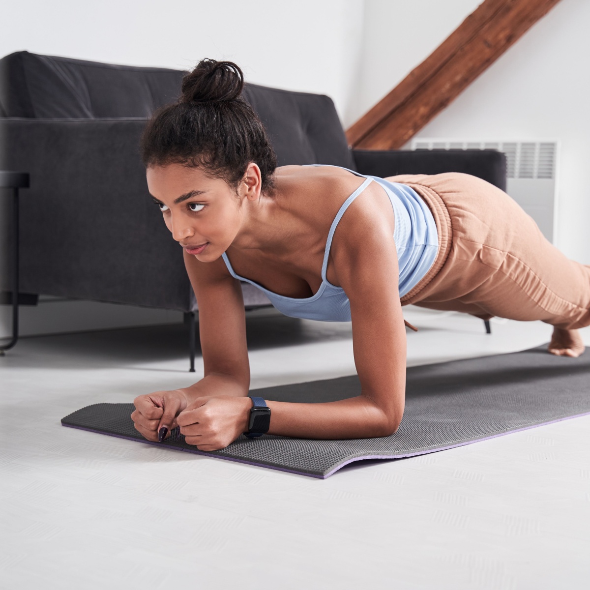 woman doing plank holds