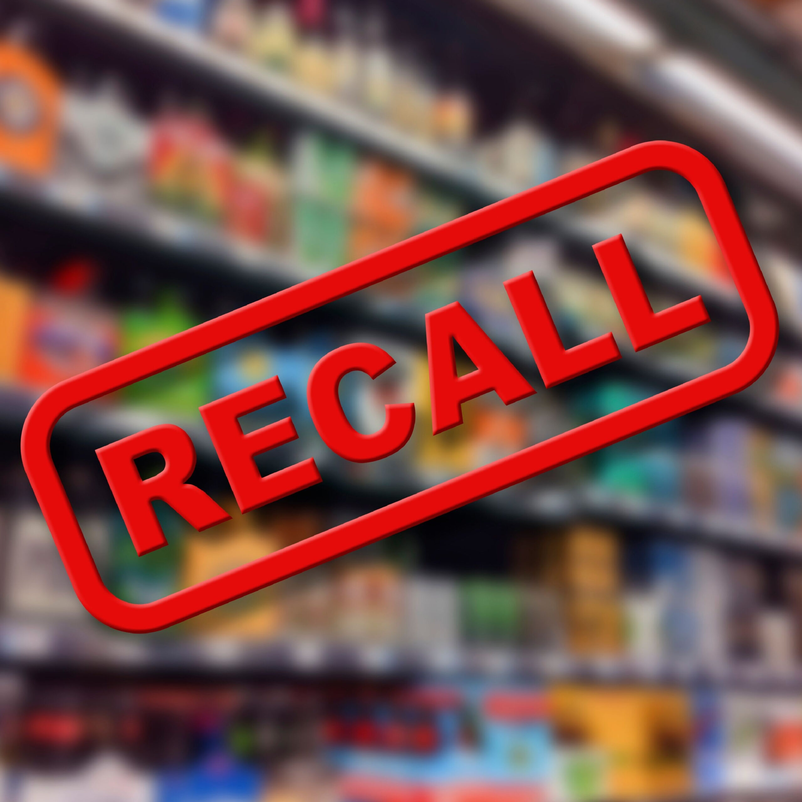recall stamp over grocery shelves