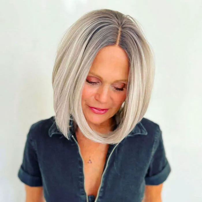 Curled under lob haircut by Shama Persson