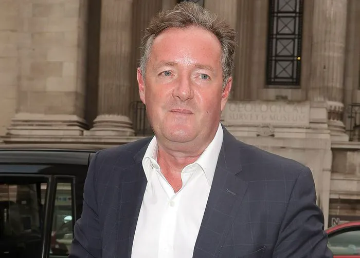 Piers Morgan in grey suit