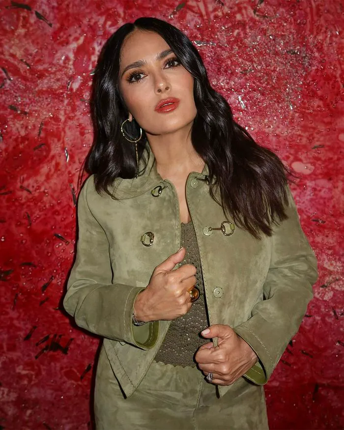 "Salma Hayek in a green outfit at Private Gucci Dinner honoring Jannik Sinner"