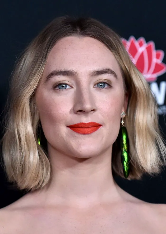 Saoirse Ronan with an elegant graduated bob hairstyle.