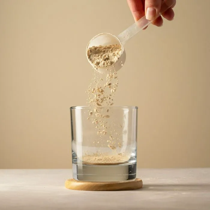 protein powder poured into a glass