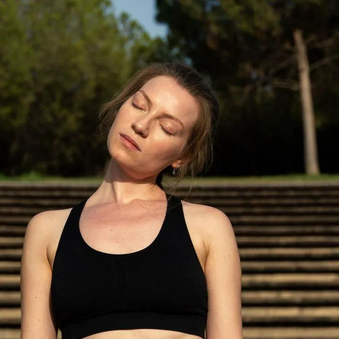 woman tilting her neck